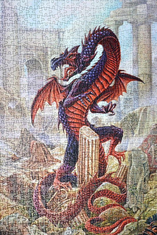 Jigsaw puzzle with a dragon design on a stone surface