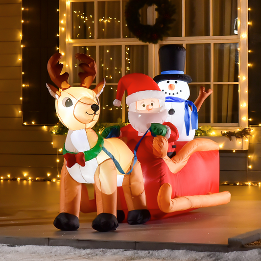 Inflatable reindeer and Santa Claus with a snowman on a sled, decorated for Christmas, in front of a window with lights.