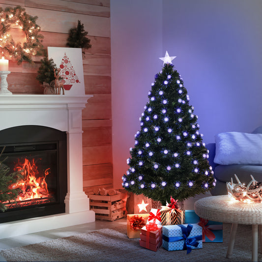 Living room with a Christmas tree, fireplace, and presents