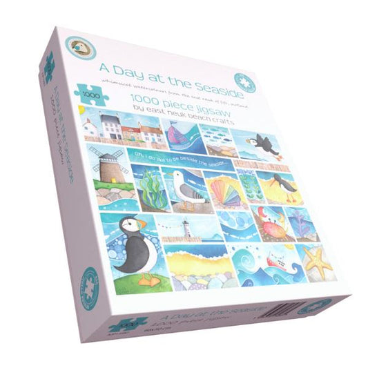 Puzzle box titled 'A Day at the Seaside' with puffins and beach elements on a white background
